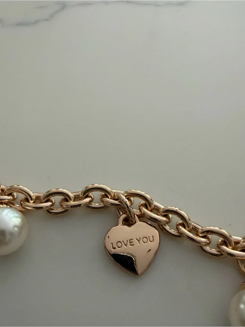 Bag Chain - gold tone with faux pearls and hearts that say “ Iove you”